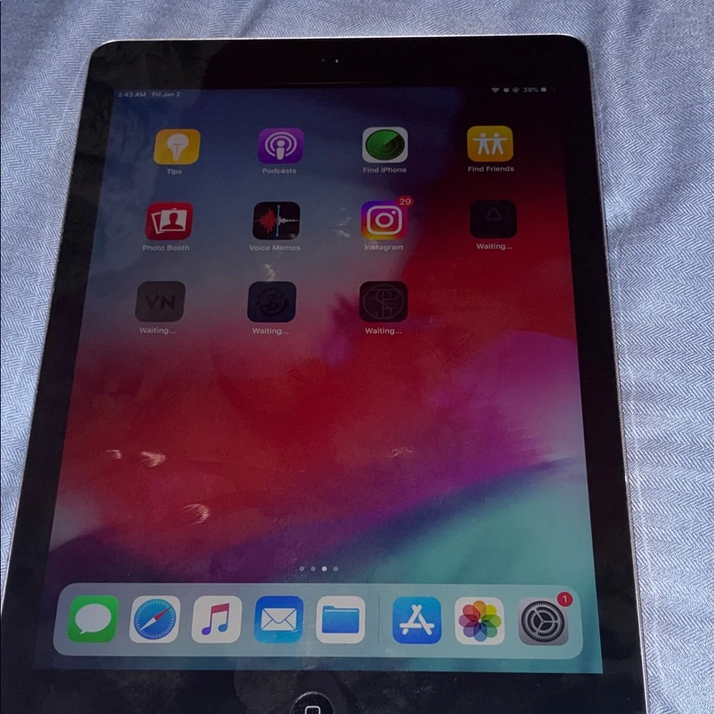 Apple Tablet with Vibrant Red and Blue Display